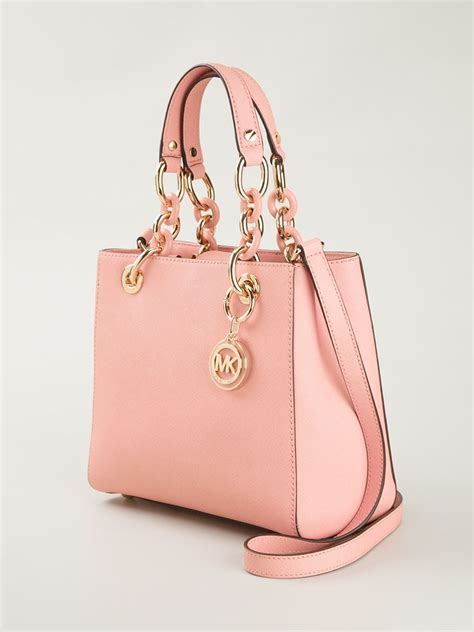 pink michael kors book bag|Michael Kors pink suitcase.